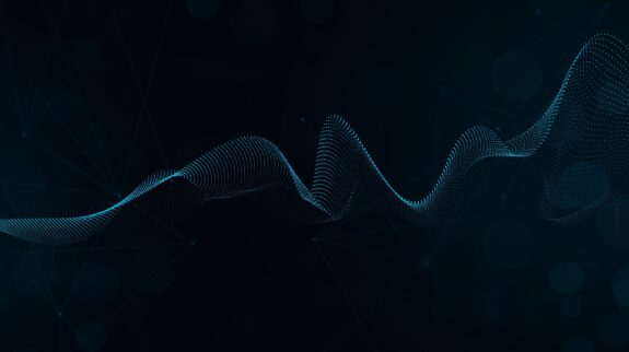 Abstract,Digital,Waveform,Of,Glowing,Blue,Particles,In,Dark,Space